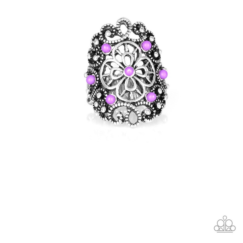 Silver ring with purple balls